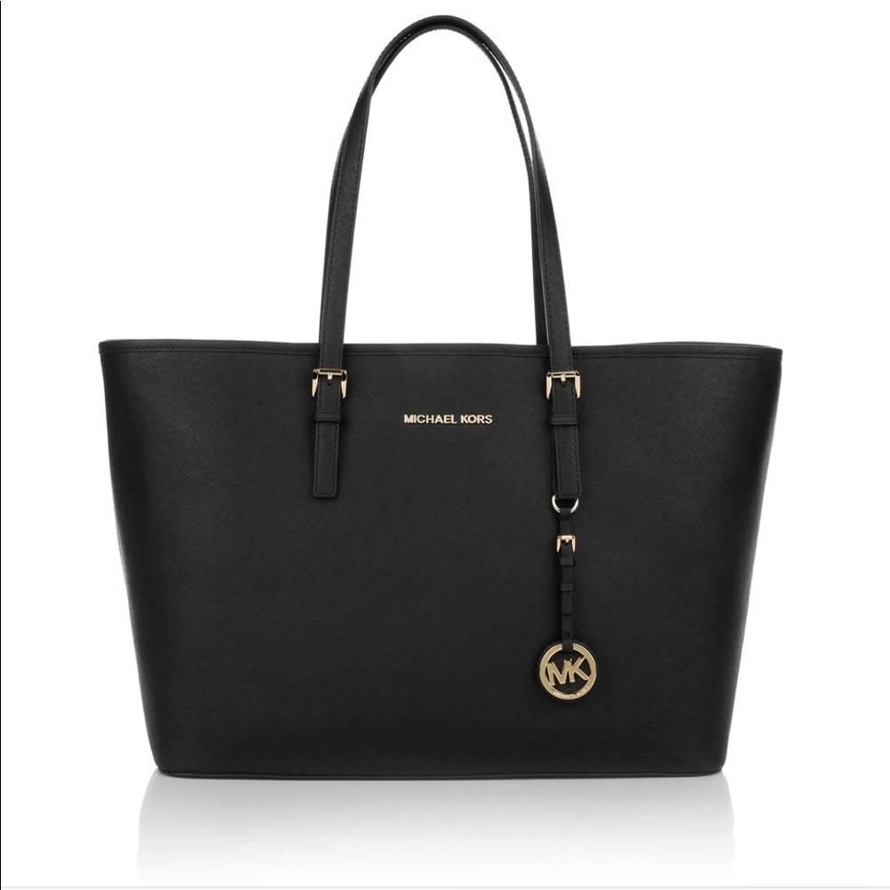SOLD Michael Kors -Jet Set